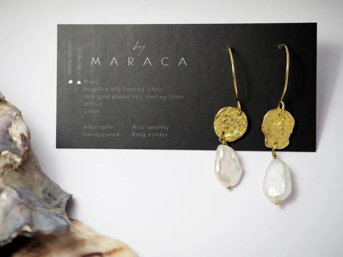 FEMME dangly earrings with large pearl