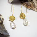 FEMME dangly earrings with large pearl