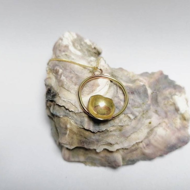 BUTTERCUP Circle & Blossom necklace