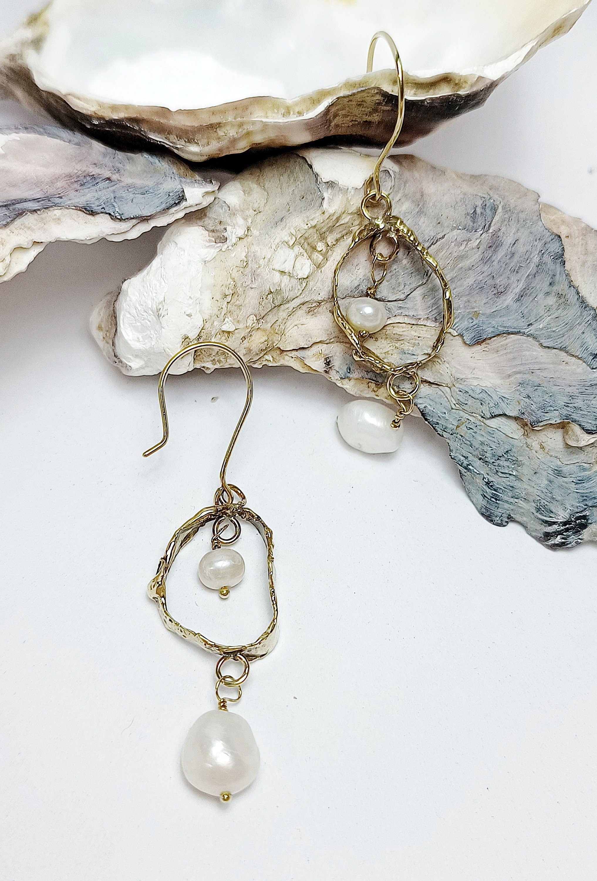 FEMME dangly double pearl earrings