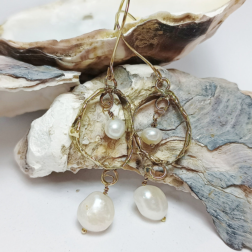 FEMME dangly double pearl earrings