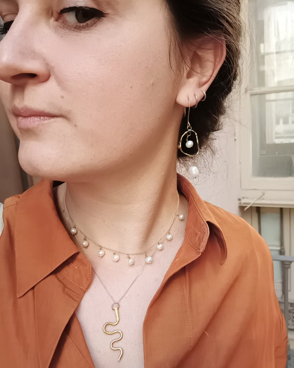 FEMME dangly double pearl earrings
